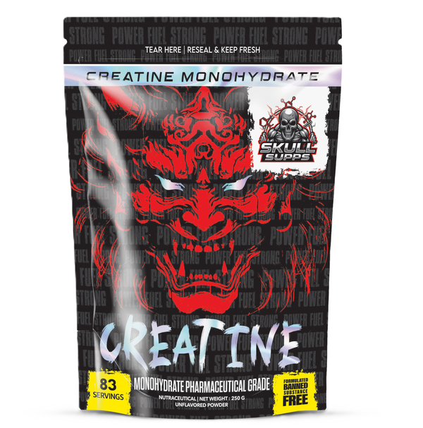 A stand-up pouch of Skull Crepe Creatine Monohydrate dietary supplement. The packaging is black with a prominent red Japanese demon face graphic, white 'CREATINE' text, and yellow accents at the bottom.